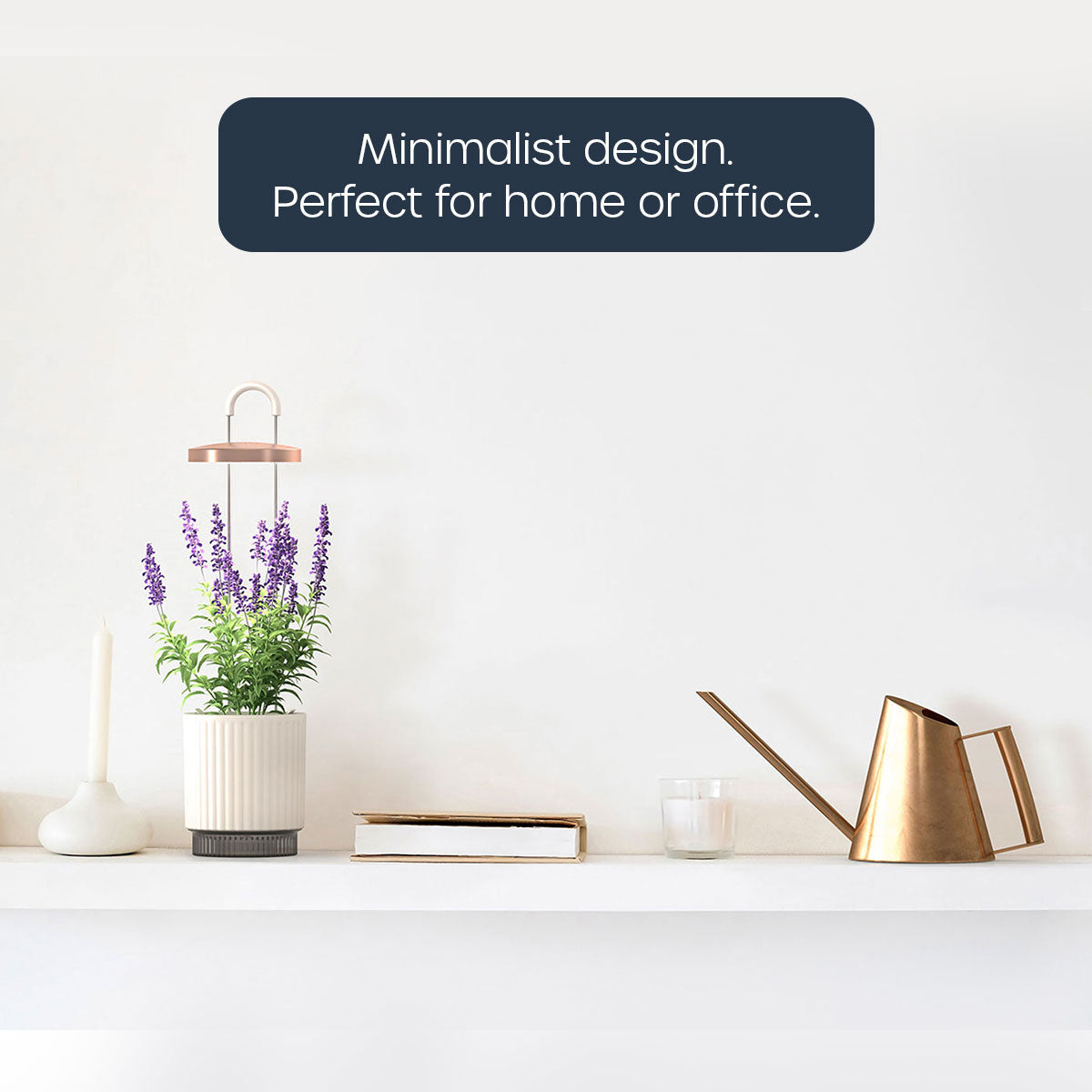 Mini watering can showcased on a white shelf featured next to a white and gold HydroVase.