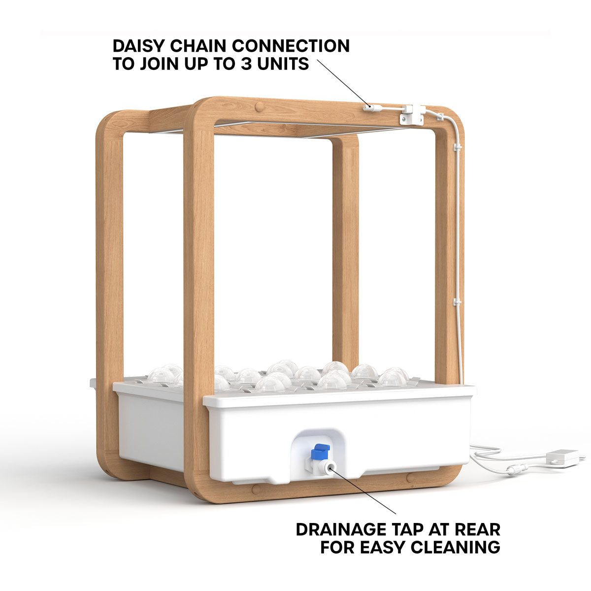 Rear of Garden Cube displaying drainage tap and daisy chain connections