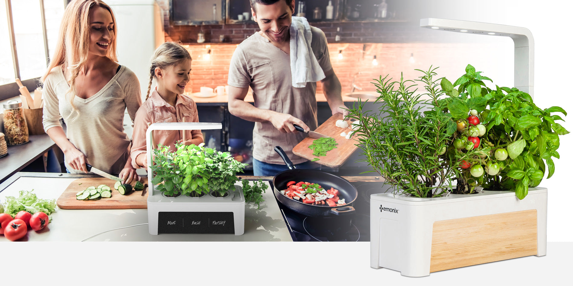 Family cooking in a kitchen using herbs from the HydroGarden 3