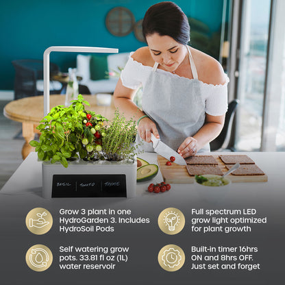 Woman slicing tomatoes grown in her HydroGarden 3 indoor garden