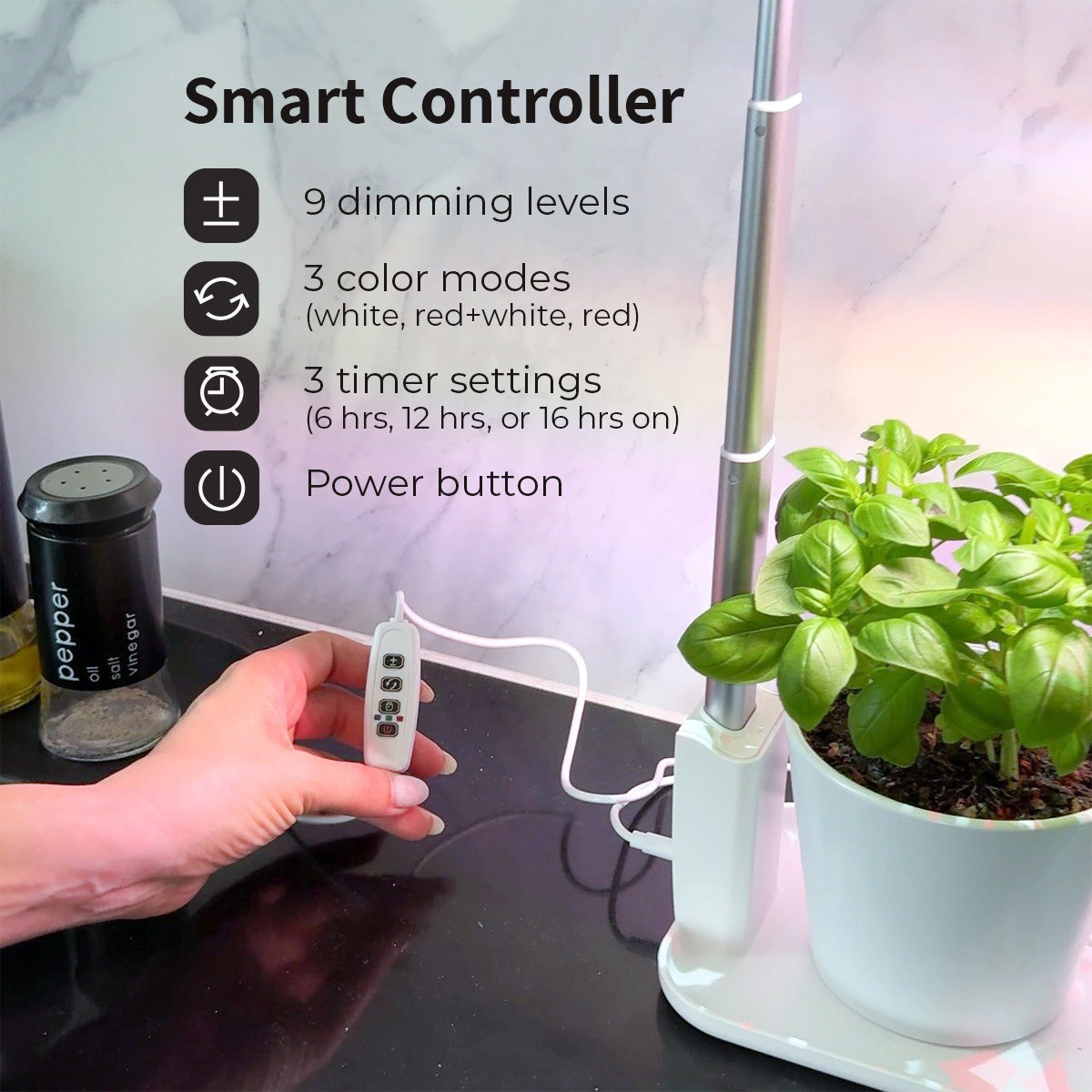 Smart controller for a grow light system with a plant on a table.