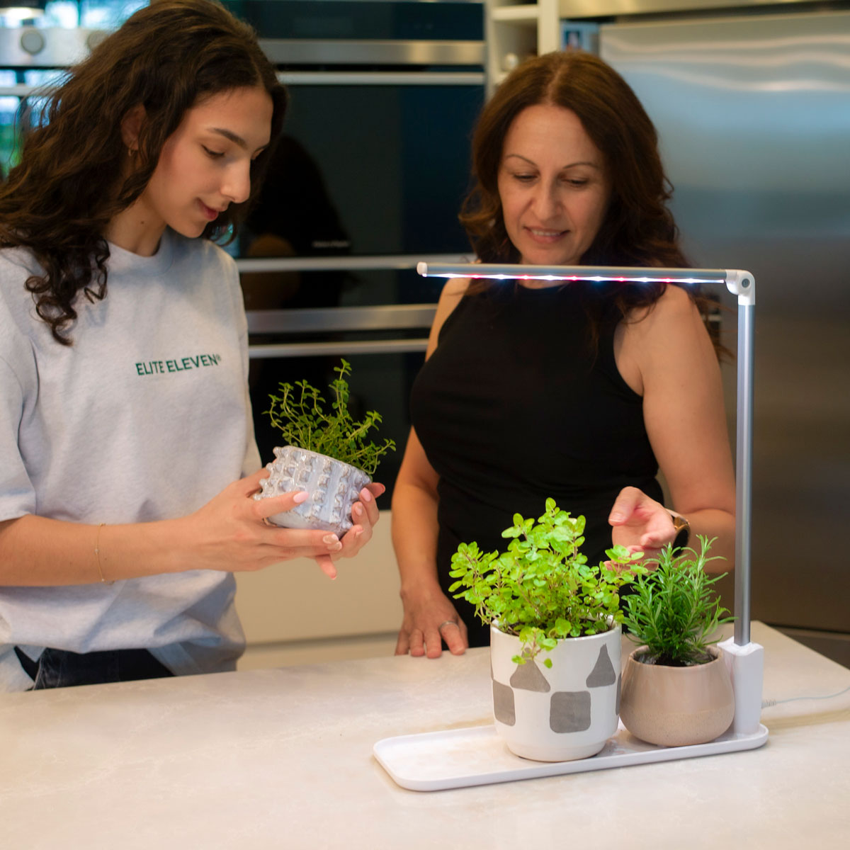 grow tray set-up with mother and daughter